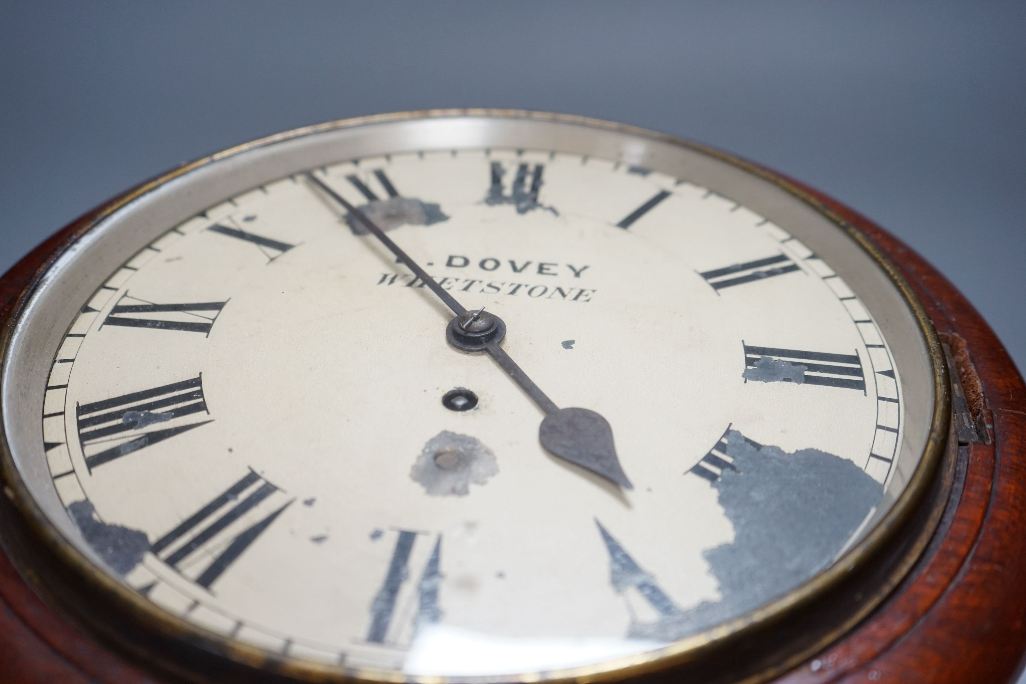 A Victorian single fusee wall timepiece, dial marked Dovey Whetstone, 32cm high